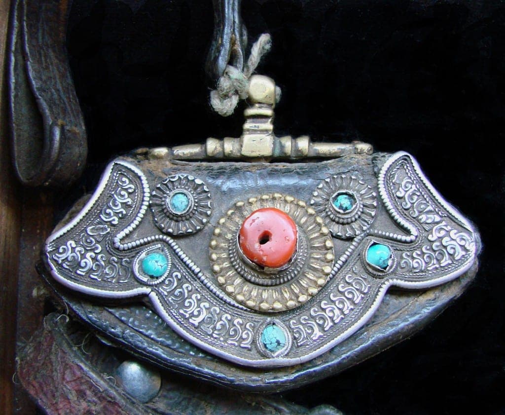 tobacco pouch made from leather, silver, bronze, coral, and turquoises