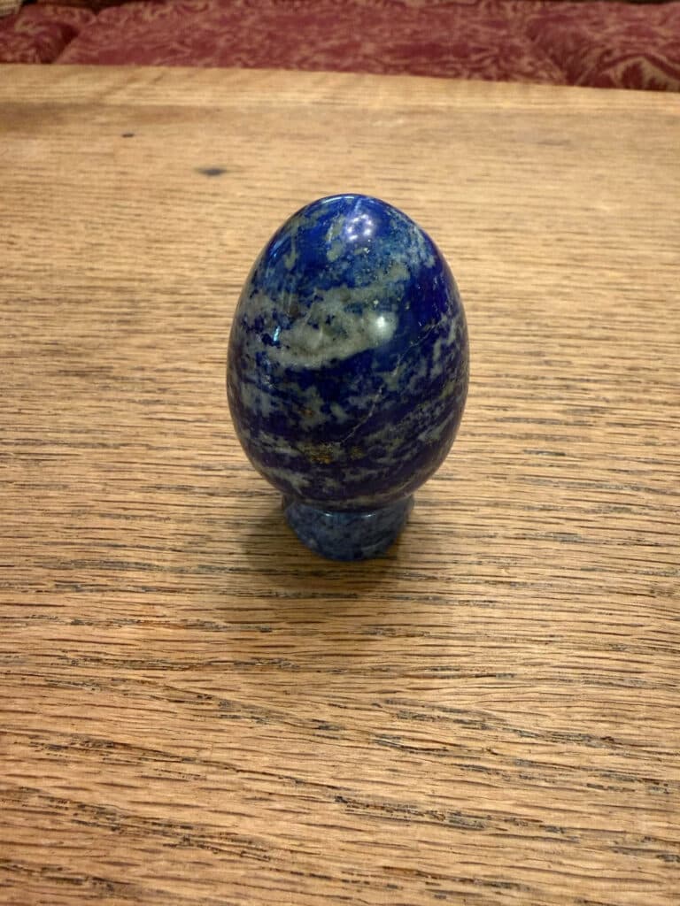 lapis egg with multiple layers of calcite
